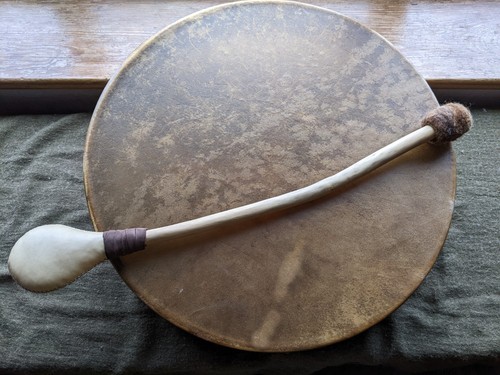 Felted drum beater with - a,