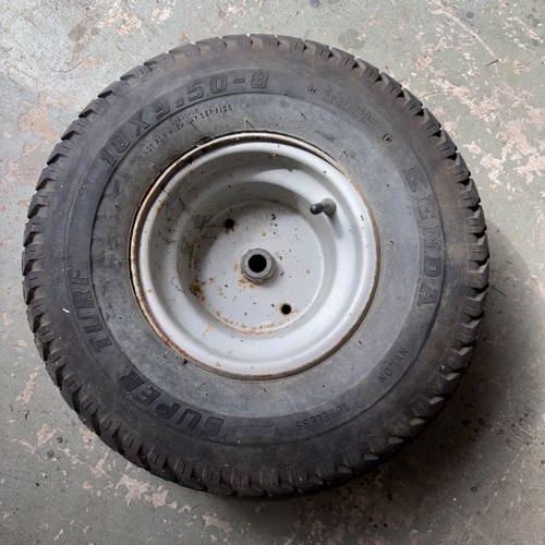 Ride lawn mower rear - on,