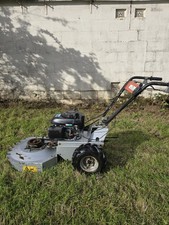 Rough Cut Lawn Mower. Compact, Pedestrian Mower, Self Propelled.