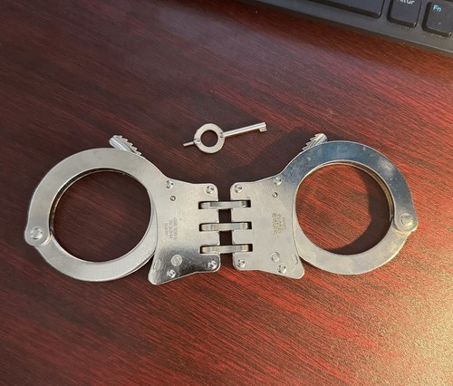Hiatts hinged handcuffs with - hinged,