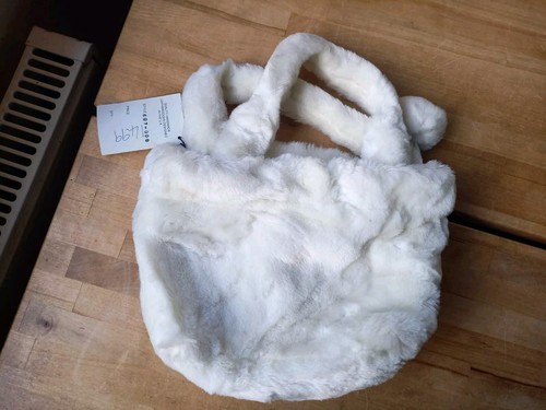 Super soft off - white, faux