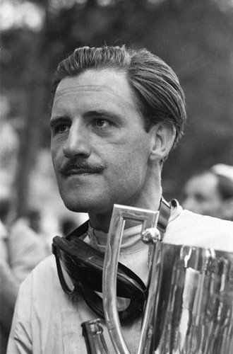 Graham hill celebrates victory - hill,