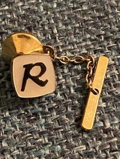 A Vintage Sophos tie pin with