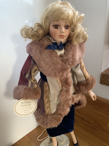 Genuine porcelain doll - , named