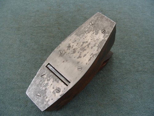 Steel soled wooden smoothing