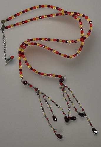 Long red orange - orange, bead