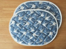 Pair of Quilted Oval Table