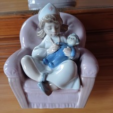 Nao By Lladro Figurine Girl Playing Nurse 1055 Porcelain Sitting Chair Doll Pink