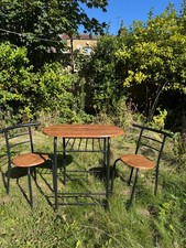 small round kitchen table and 2 chairs