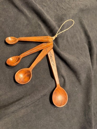 Wooden measuring spoons hand - spoons,