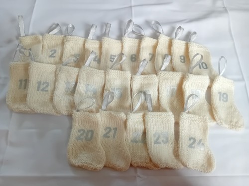 Hand knitted advent calendar - hand,