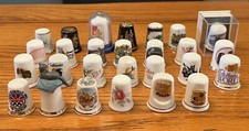 27 CERAMIC THIMBLES