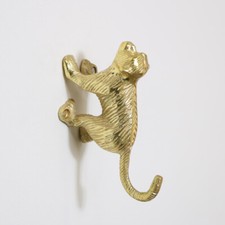 Gold metal monkey wall mounted
