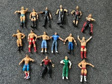 **Lot of 16 WWE Wrestling Action Figures – Mixed Brands (Mattel, Jakks Pacific)*