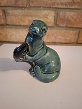 Vintage Otter Seal Holding