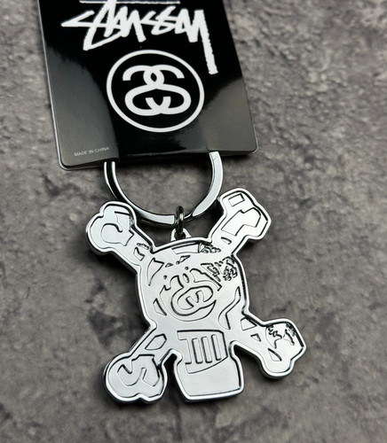 Stussy skull keychain gold - skull,