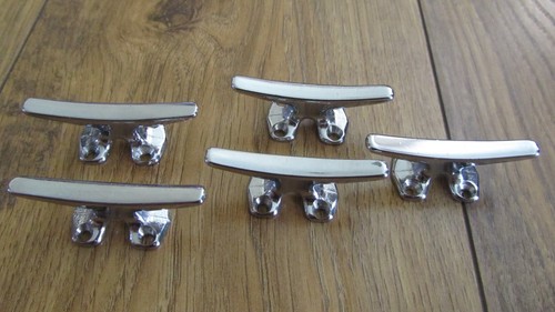 Five four hole boat cleats - five, four-hole