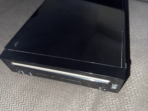 Black nintendo wii with guitar - wii,