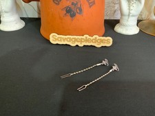 Pair of tiny dancer antique pickle forks silver, twist stem