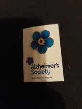 C/Alzheimer's Society Forget Me Not Pin Badge