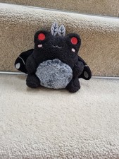 Black bug frog from Claire's accessories.