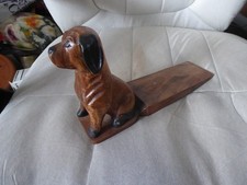 Wooden carved dog door stop