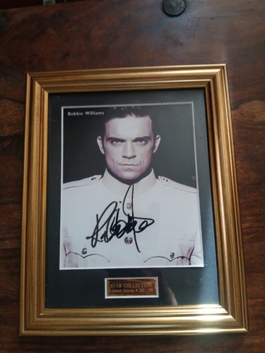Robbie williams signed photo - robbie,