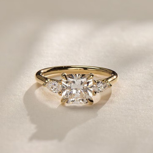 Cushion cut three stone - three,
