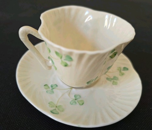 Belleek teacup and saucer - and,