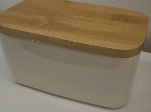 Ceramic butter dish with - butter,
