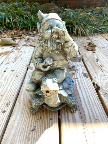 Adventurous gnome sitting - gnome,