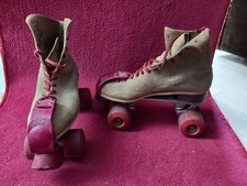 roller skates, classic by "independent truck co" size 7, tan suede boots. 