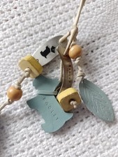 Radley leather dog tag/ bag charm. Leather, beads and metal Radley logos. Good.