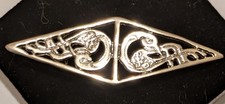 Celtic Swans Brooch, Based on