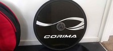 Corima disc and tri spoke rim brakes 11-speed fitted with tub tires.
