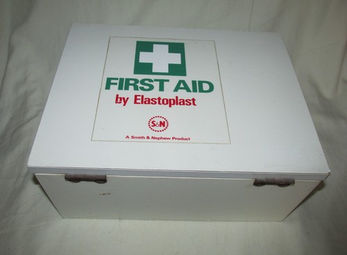 Vintage wooden first - first, aid