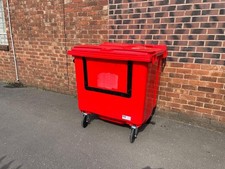 1100 litre drop front wheelie bin red - brand new with markings removed