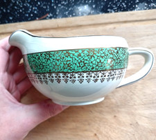 Wedgwood Art Deco green & gold milk jug. Looks like J & G Meakin 'Florida'.