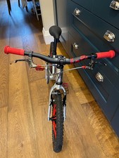Early Rider Seeker/Belter 16 kids bike - chrome with red accessories