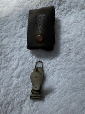 EDWARDIAN MOTHER OF PEARL POCKET NAIL CLIPPERS IN LEATHER POUCH