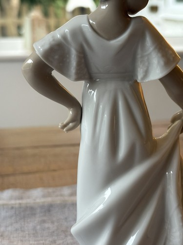 Lladro nao how pretty - how,