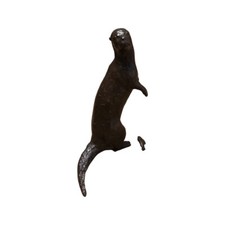 Bronze Otter and catch 