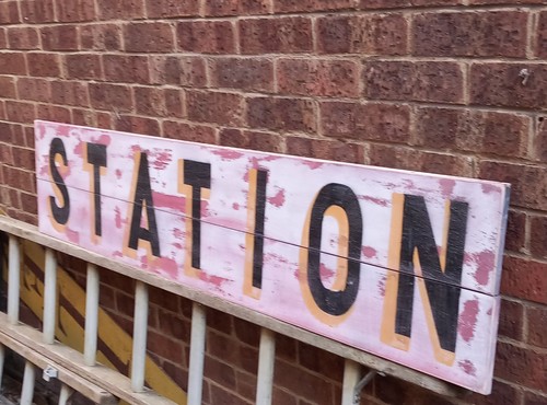 Large painted station sign - station,