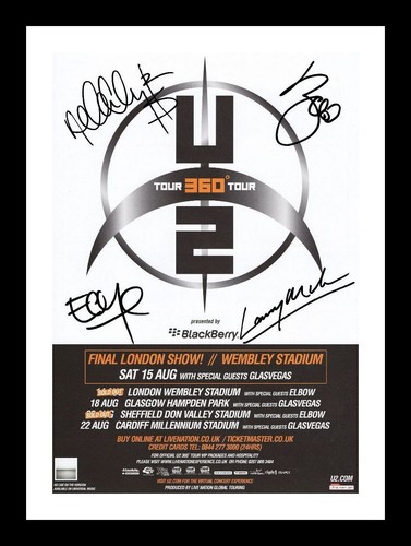 Entire band autographed - u2,