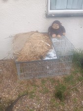 three rabbit hutch (cage)