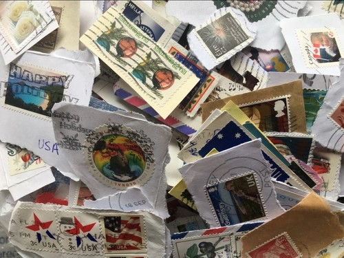 Postage stamps on - postage,