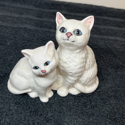 Pair white persian ceramic - of,
