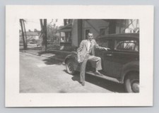 Man Standing Beside His 1939
