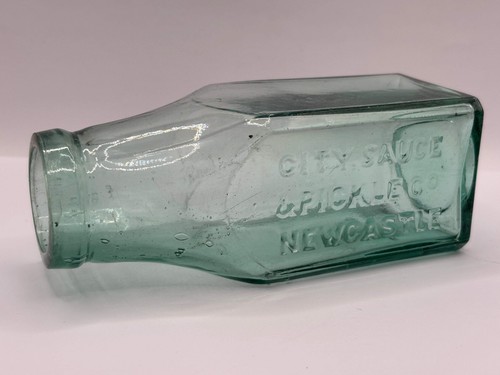 Old aqua glass advertising