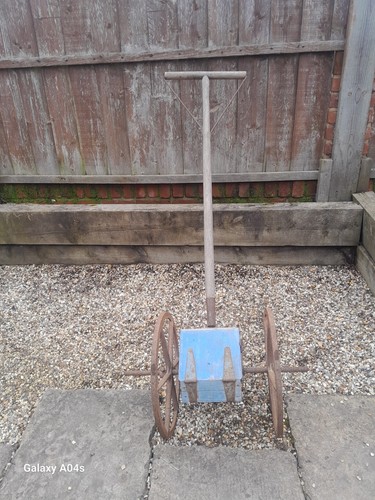 Vintage push seed drill - push,